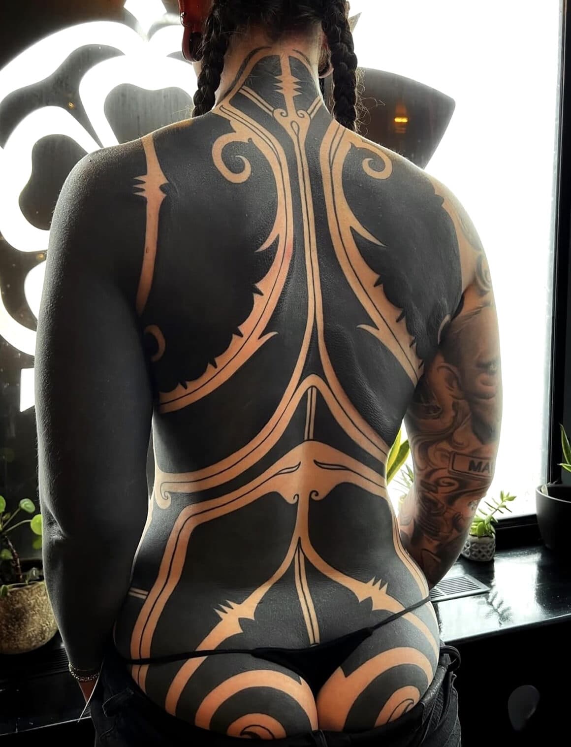 Tribal: black, powerful symbols and lines